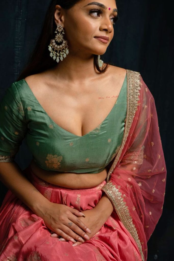 Pink Saree with a Regal Green Blouse