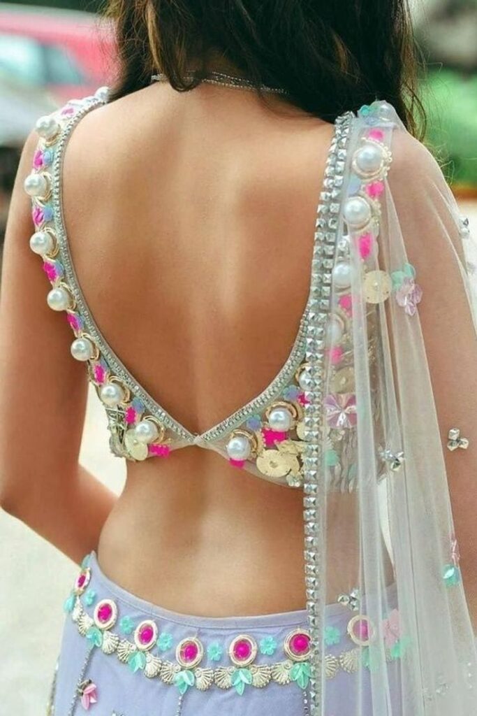 Deep Back Neck Net Blouse Designs